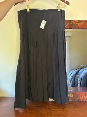 Black pleated midi skirt, Original Neiman Marcus retail tag: $650.00